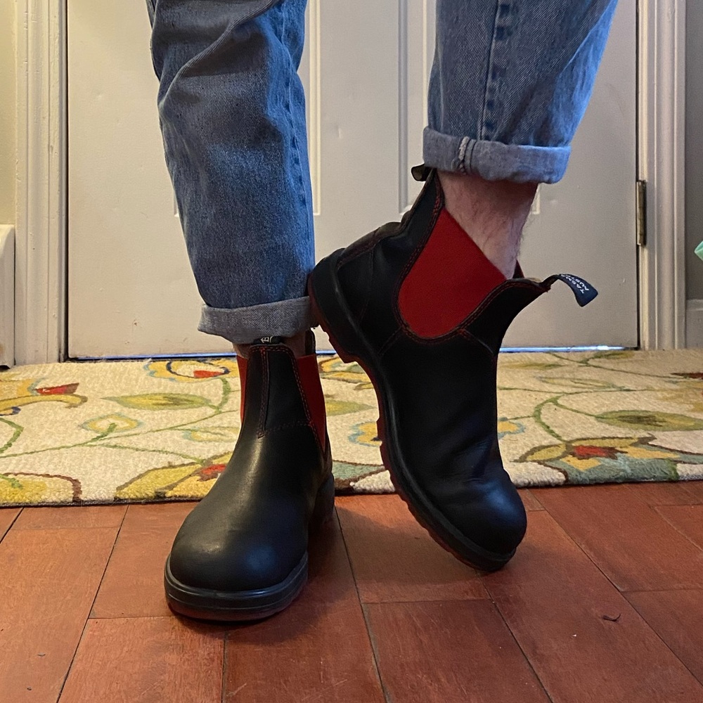 Red and black blundstone boots